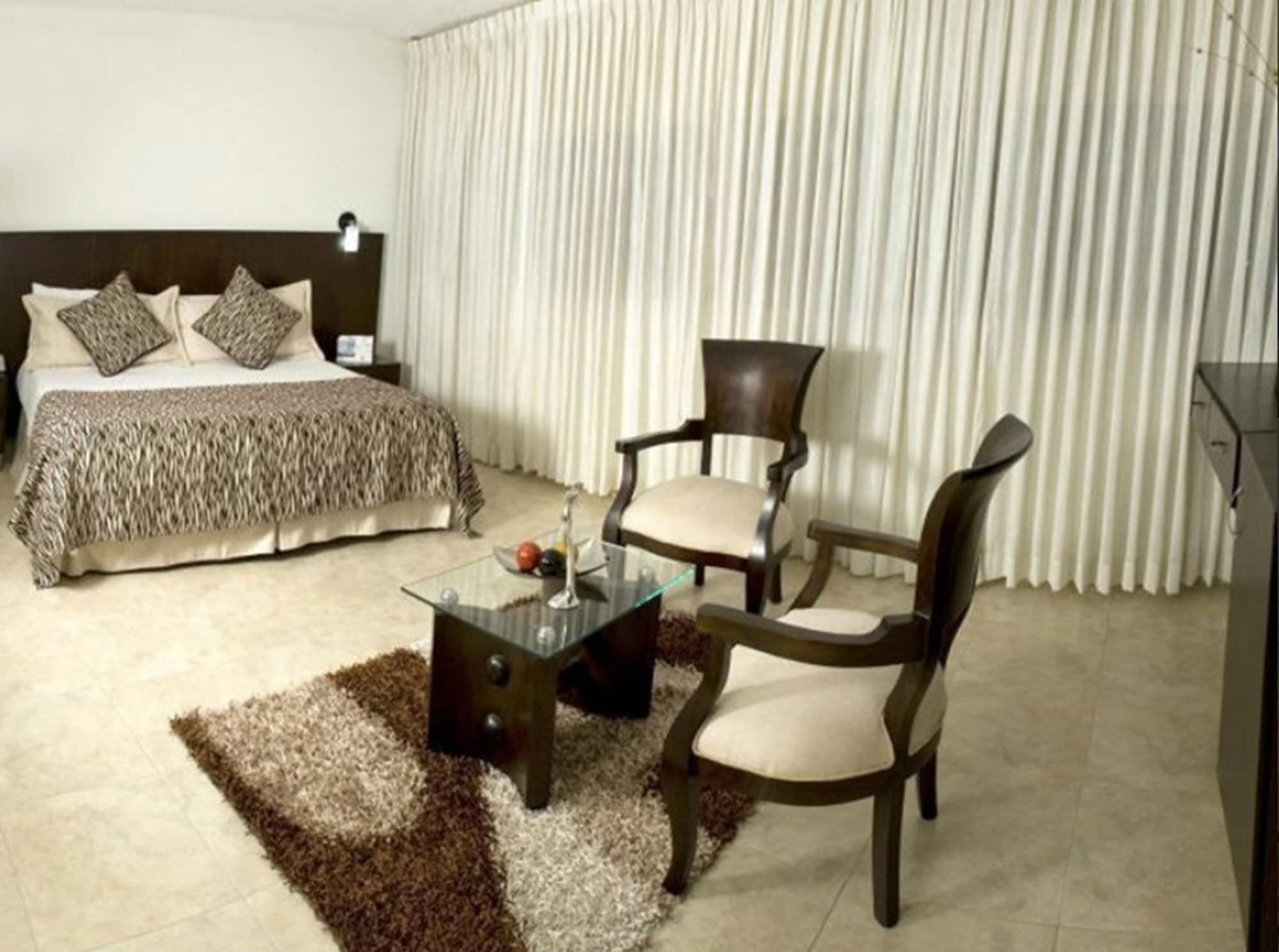 Hotel Casino Internacional Cúcuta Esterno foto A bedroom at the hotel