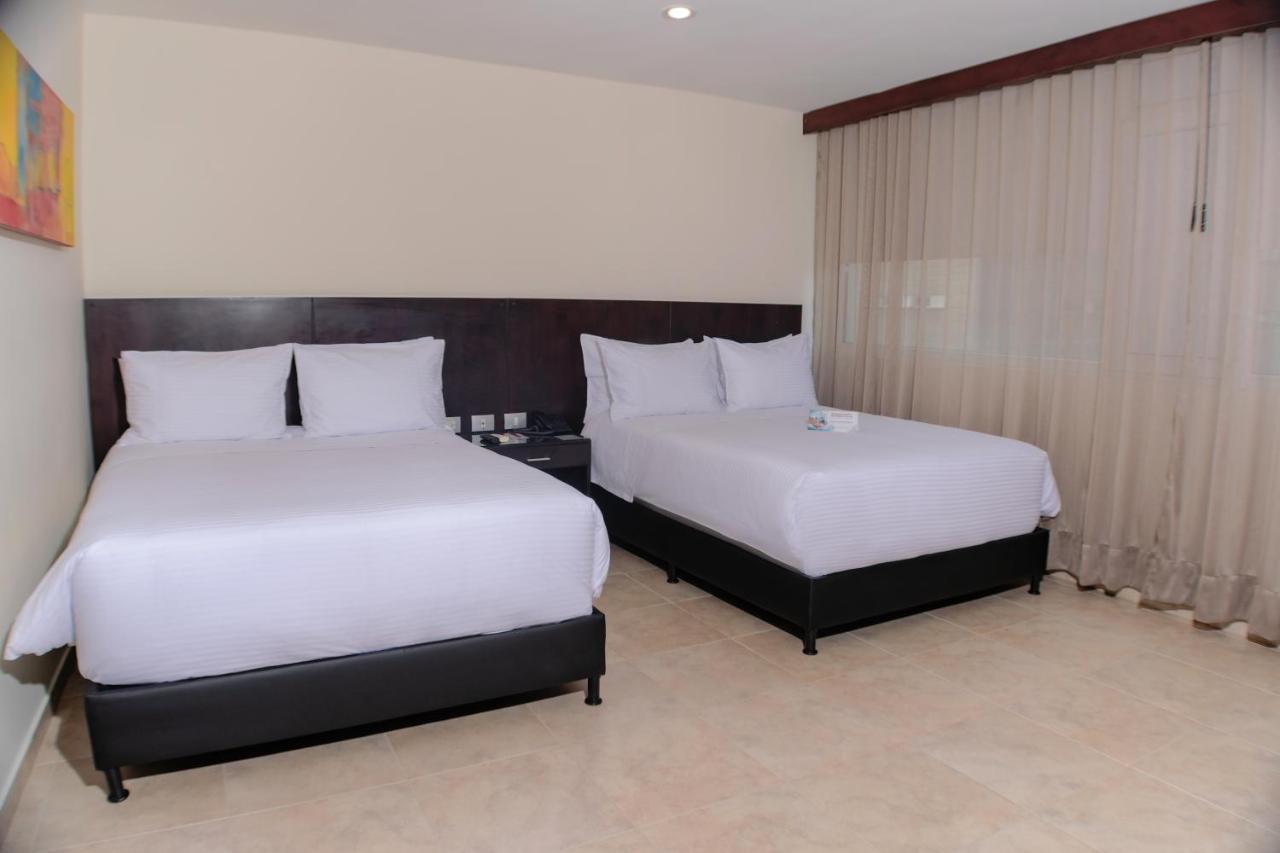 Hotel Casino Internacional Cúcuta Esterno foto A room at the hotel