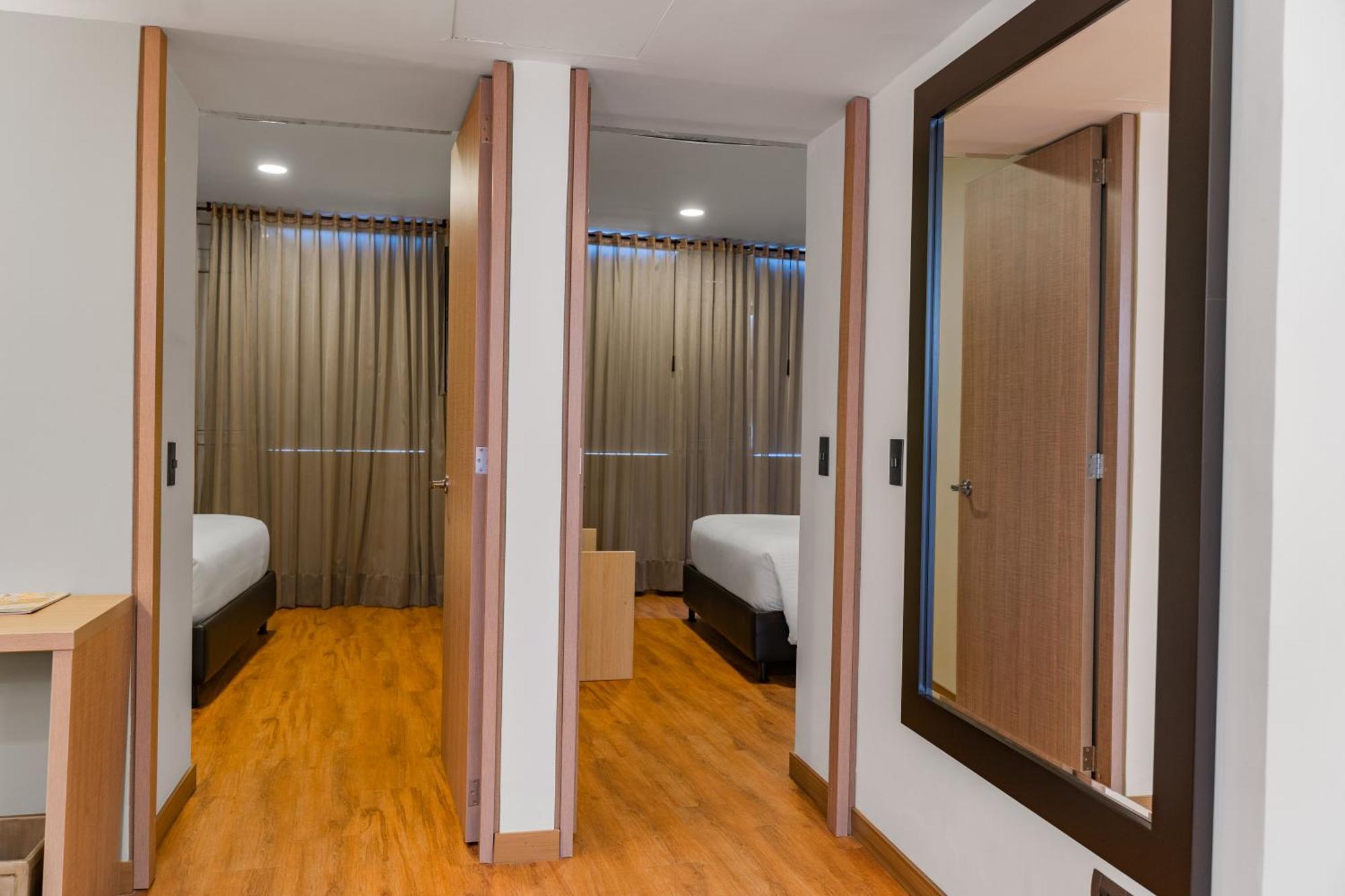 Hotel Casino Internacional Cúcuta Esterno foto A typical bedroom at the University of Nottingham's Jubilee Hall