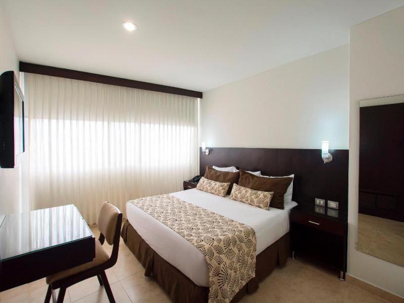 Hotel Casino Internacional Cúcuta Camera foto A bedroom at the hotel